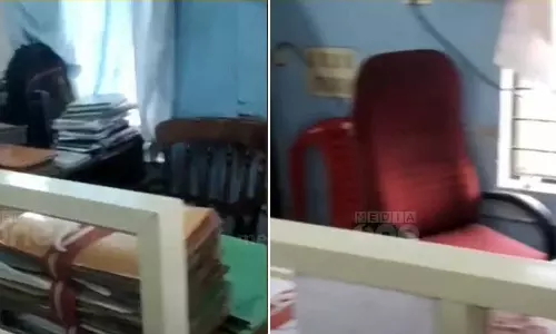 Perumanna Panchayat employees went to the Navkerala Sadass sloganeering during their working hours