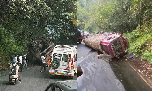 A cargo lorry overturned at the Thamarassery pass A cargo lorry overturned at the Thamarassery pass