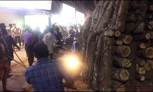 passenger of the car trapped under the timber lorry had a miraculous escape