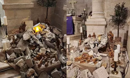 infant jesus with kafia church in Bethlehem Christmas celebration in solidarity with Palestine