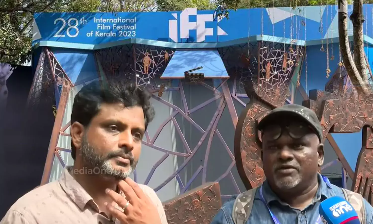 the two men behind the iffk logo design the two men behind the iffk logo design
