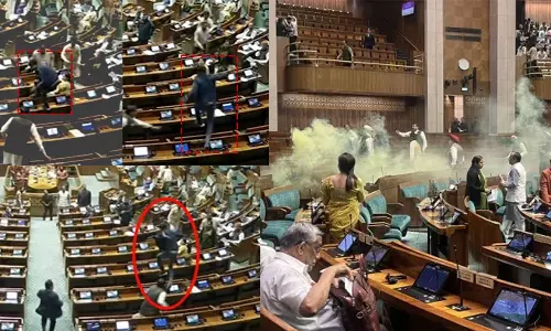 security breach, two enter Lok Sabha, open smoke canisters,security breach Lok Sabha,Lok Sabha security breach,Major security breach inside Lok Sabha,yellow-coloured smoke.,ലോക് സഭയില്‍ സുരക്ഷാവീഴ്ച,കളര്‍ ബോംബ്