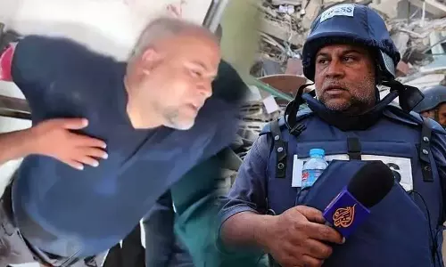 Israeli drone strike wounds two Al Jazeera journalists including Gaza bureau chief Wael al-Dahdouh, Israeli drone strike wounds Wael al-Dahdouh,