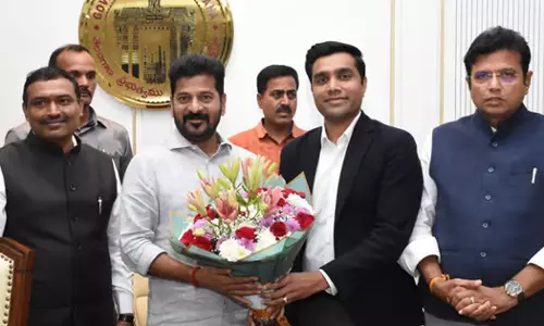 A delegation of Adani Group met Congress Chief Minister Revanth Reddy who took office in Telangana