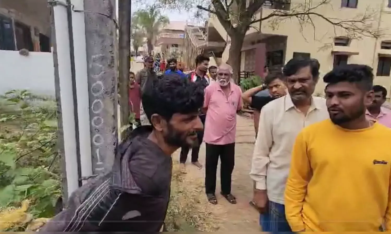 Karnataka Man Tied To Pole, Thrashed For Making Video Of Woman Taking Bath Karnataka Man Tied To Pole, Thrashed For Making Video Of Woman Taking Bath