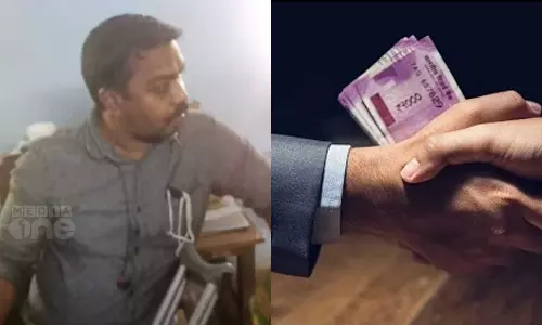 Village officer and field assistant arrested while accepting bribe