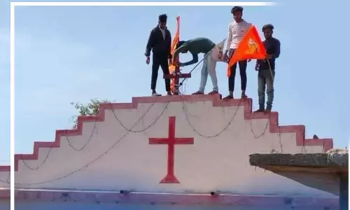 suffron flag put up churches in Madhyapradesh