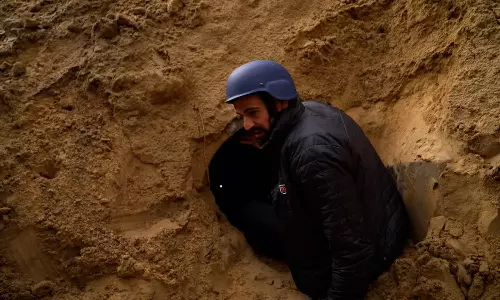 gaza tunnel under cemetery
