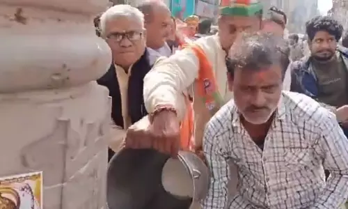 BJP workers cleaned the place where Congress leader Rahul Gandhi spoke with Ganga water | | Bharat Jodo Nyay Yatra.