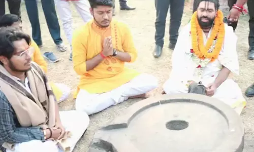 A Hindu Sannyasi and his group performed puja at an ancient Adina Mosque in West Bengal