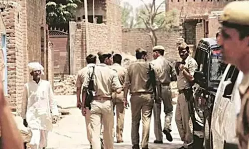 Posters asking Hindus not to sell or rent property to Muslims in Nandapuri Colony, Jaipur, Rajasthan