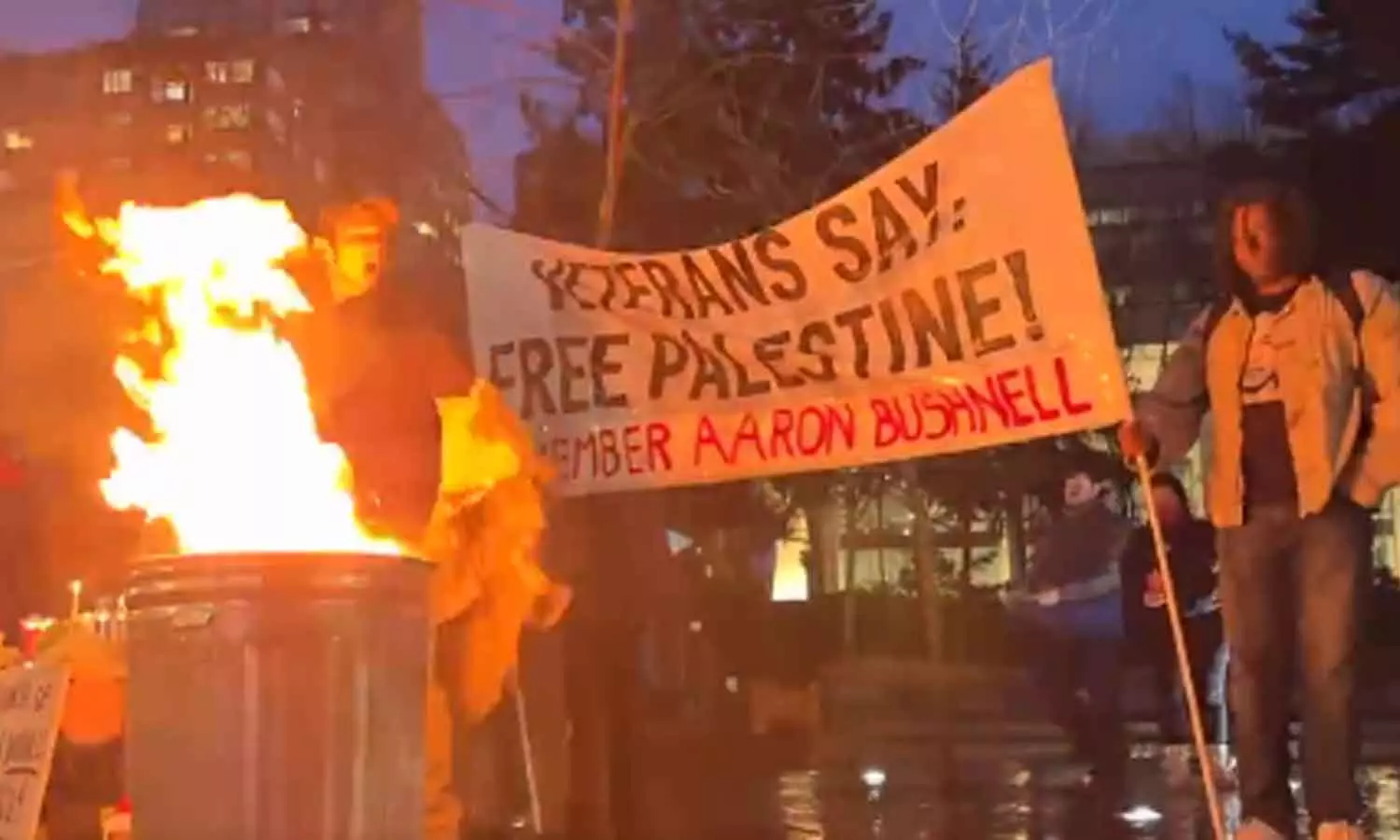 US military veterans burn their uniforms outside the Israeli embassy in Washington US military veterans burn their uniforms outside the Israeli embassy in Washington