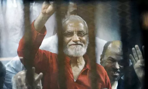 Egypt confirms death penalty for eight opposition politicians including the Muslim Brotherhood president Mohamed Badie