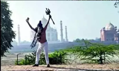 Akhil Bharat Hindu Mahasabha leader Pawan Baba arrested for performing Shiva Tandava dance and Jalabhisheka near Agra Taj Mahal.