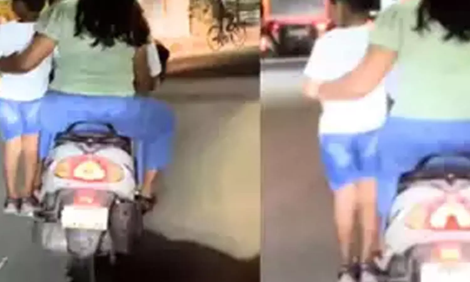 Footrest,Bengaluru Couple ,Child Standing On Footrest,Viral video,ബംഗളൂരു,ട്രാഫിക് നിയമലംഘനം,ഫൂട്ട്റെസ്റ്റില്‍യാത്ര,ബംഗളൂരു ട്രാഫിക്,വൈറല്‍ വീഡിയോ