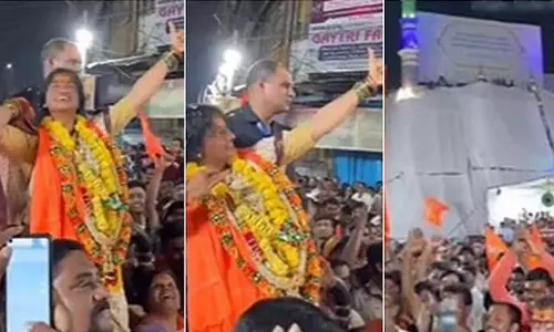 BJP candidate in Hydarabad shooting an arrow at the mosque