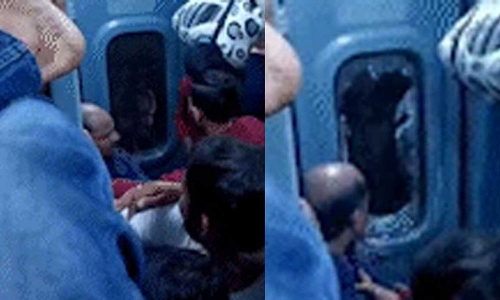 Passenger broke the door of the AC coach of the train