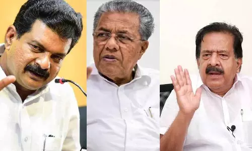 PV Anwar and Ramesh Chennithala PV Anwar and Ramesh Chennithala
