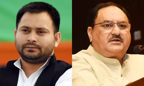 JP Nadda distributed bags full of money
