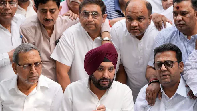 Former Delhi Congress chief Arvinder Singh Lovely with his supporters Former Delhi Congress chief Arvinder Singh Lovely with his supporters