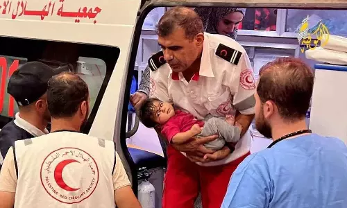 Qatar Red Crescent with a new model in the field of emergency services in Gaza Qatar Red Crescent with a new model in the field of emergency services in Gaza