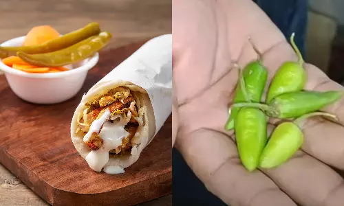 Hotel owner and children beaten up alleges small chilly served with shawarma in malappuram Hotel owner and children beaten up alleges small chilly served with shawarma in malappuram