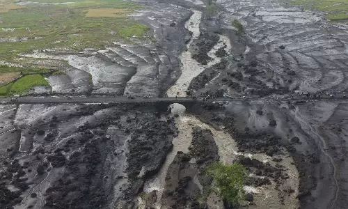 Indonesia seeds clouds to block rainfall after floods killed at least 67 people