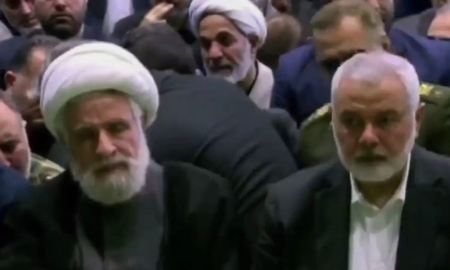 Hamas leader Ismail Haniyeh pays last respects to Ibrahim Raizi