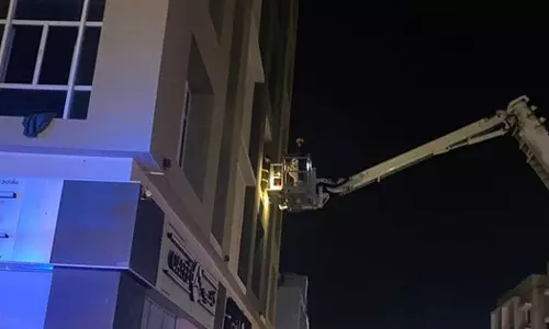 17 people rescued with crane after apartment fire in Seeb