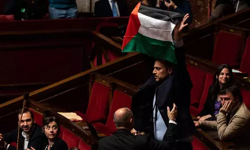 French MP Suspended For Waving Palestinian Flag In Parliament
