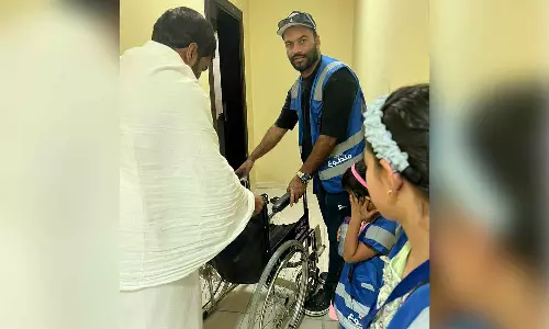Tanima volunteers distributed wheelchairs to sick pilgrims Tanima volunteers distributed wheelchairs to sick pilgrims