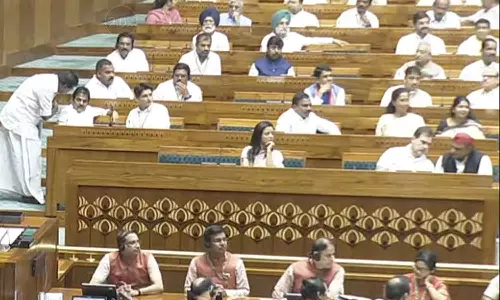 Mahua Moitra sitting in the first row of parliament