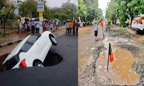 Roads in Gandhinagar, Amit Shahs constituency, turns potholes by heavy rains; Locals protest by planting BJP flag, Gujrat rain 2024