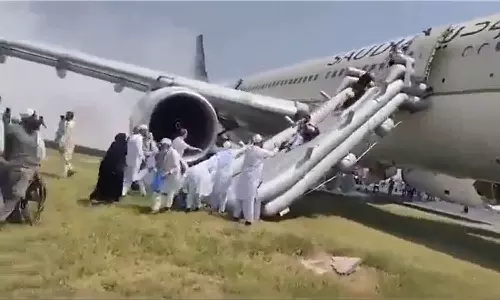 A Saudi Airlines flight caught fire while landing