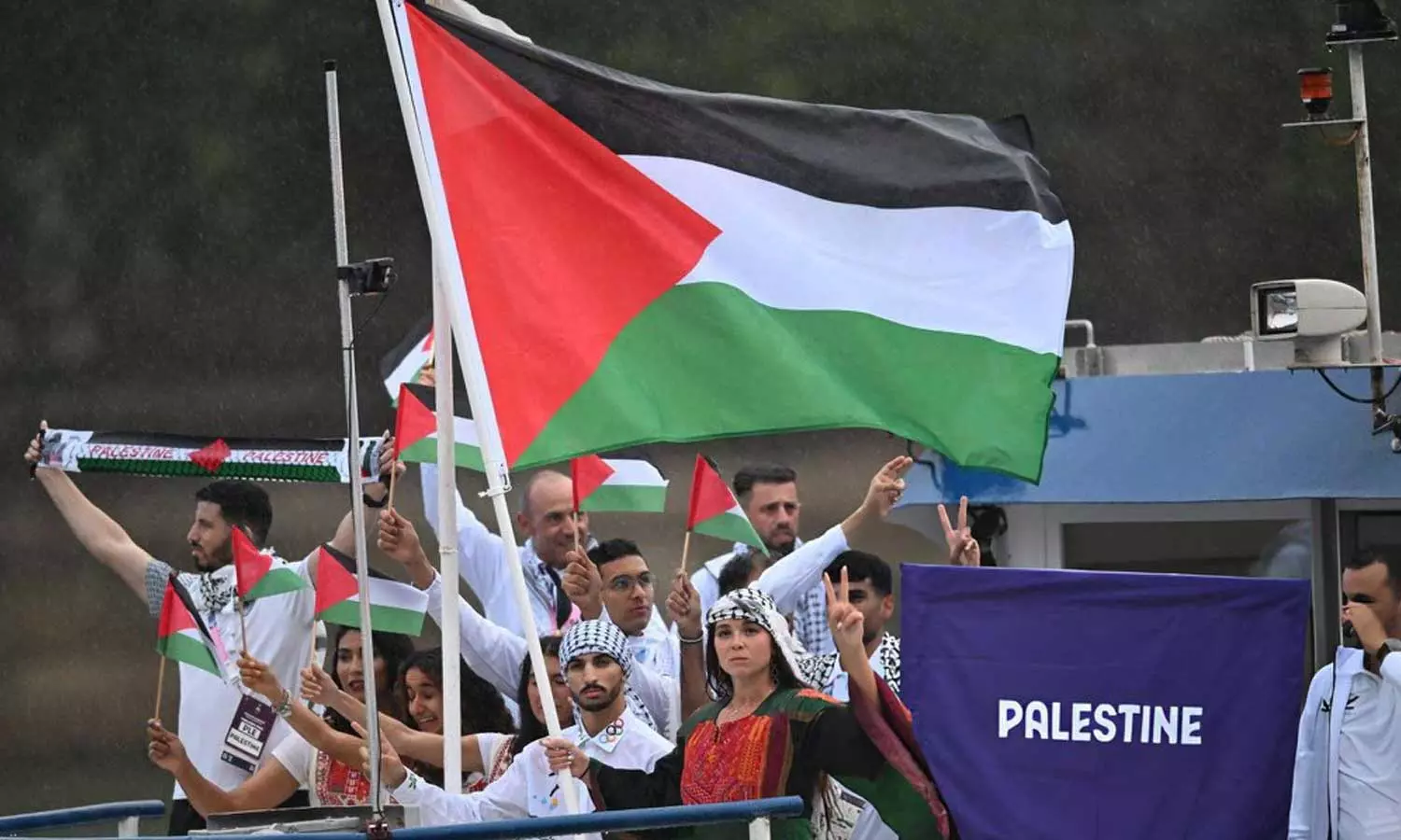 Out of the ashes, we always rise, Palestine’s Olympic team makes their entry into the Paris Olympic Games, Paris Olympics 2024, Palestine in Olympics,
