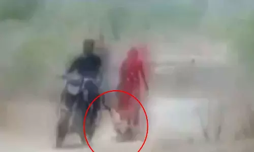Tied wife to a bike and dragged; Husband arrested Tied wife to a bike and dragged; Husband arrested