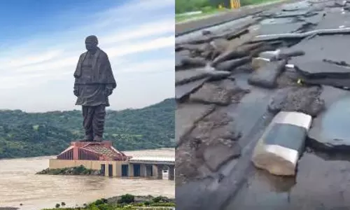 Part of road to Statue of Unity washed away