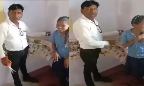 Drunk teacher cuts students hair; Followed by suspension- video, latest news malayalam, മദ്യപിച്ചെത്തിയ അധ്യാപകൻ വിദ്യാർഥിനിയുടെ മുടി മുറിച്ചു; പിന്നാലെ സസ്പെൻഷൻ- വീഡിയോ