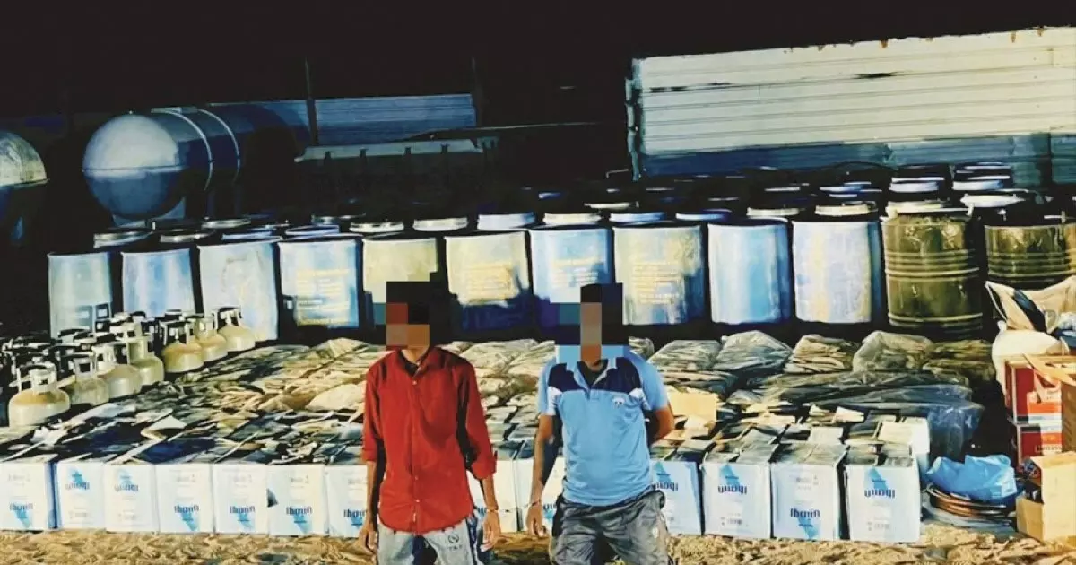 A liquor factory in the desert of northern Kuwait; Two people arrested