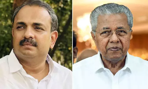 kp noushad ali and pinarayi vijayan