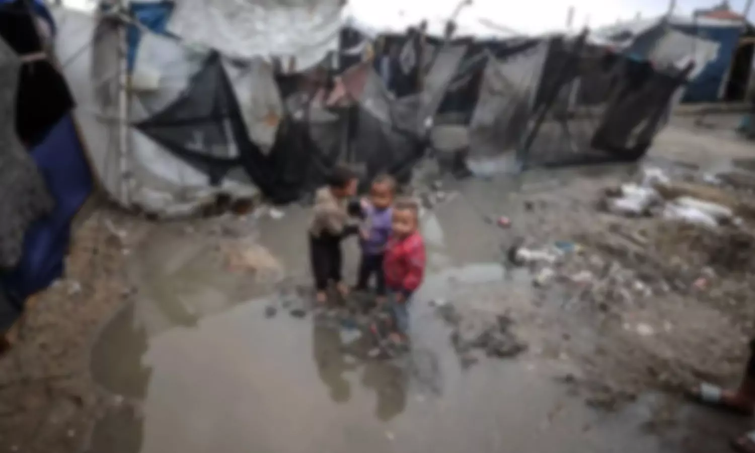 Heavy rains add to plight of displaced civilians in Gaza amid Israeli war