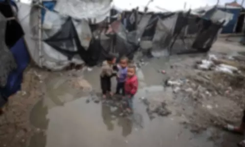 Heavy rains add to plight of displaced civilians in Gaza amid Israeli war