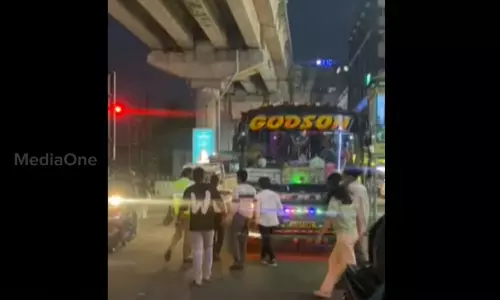 SFI activists stopped the private bus SFI activists stopped the private bus