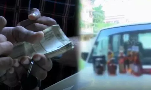 Vigilance team seized Liquor bottles and illegal cash from excise vehicle