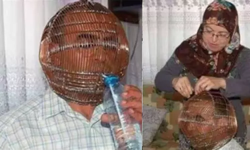 പുകവലി നിർത്താൻ തല കൂട്ടിലടച്ച് യുവാവ്; താക്കോൽ ഭാര്യയുടെ കൈയിൽ