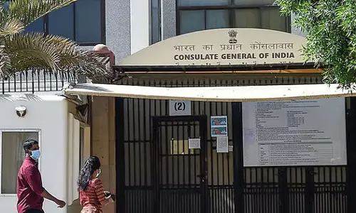 Life insurance for expatriate workers in UAE; premium of 32 dirhams per year