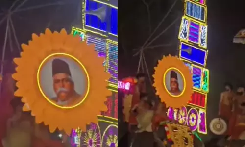 കുടമാറ്റത്തിലും ഹെഡ്‌ഗേവാർ; കൊല്ലം പുതിയകാവ് പൂരത്തിൽ ആര്‍എസ്എസ് നേതാവിന്‍റെ ചിത്രം ഉയര്‍ത്തി,വിവാദം