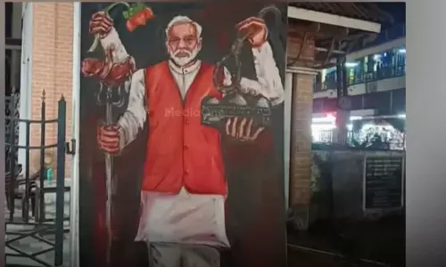 കാലടി  സർവകലാശാലയ്ക്ക് മുന്നിൽ പ്രധാനമന്ത്രിയെ വിമർശിച്ച് ഫ്‌ളക്‌സ്; അന്വേഷണം ഊർജിതമാക്കി പൊലീസ്