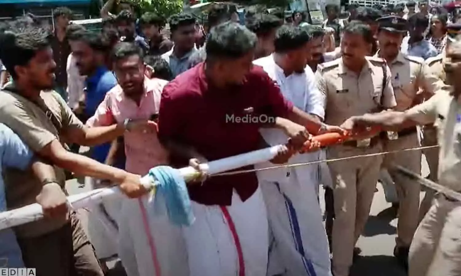 Protest against Congress, SFI members uproot another organizations flagpole Protest against Congress, SFI members uproot another organizations flagpole