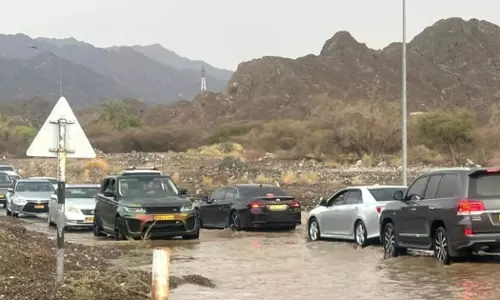 Wind and rain in Omans northern Sharqia Governorate; Floods inundate Wadi